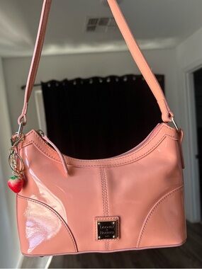 Dooney & Bourke Coral Patent Leather Banguette Shoulder Bag.